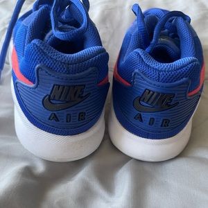 Blue and Orange Nike. Worn for a couple of hours.